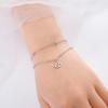 Pulsera de cadena de cuentas de doble capa para mujer con diseño de nicho simple y de moda, colgante hueco de estrella de cinco puntas y luna, pulsera de acero inoxidable
