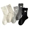 Calcetines de tela blanca Miu para mujer con lazo de encaje, calcetines holgados de dibujos animados, calcetines de media pantorrilla 25 Accesorios de moda de otoño Ins