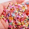 Comércio exterior joias para unhas quentes argila macia fruta pena mista argila macia adesivo de beleza cerca de 500 peças