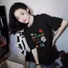 Verão 2026 Nova Camiseta Top de Algodão Puro Estilo Coreano Tamanho Grande com Estampa Divertida de Desenho Animado, Unissex de Manga Curta e Versátil
