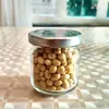 Garrafa de Vidro Mini Mais Vendida, Garrafa de Mel, Garrafa de Pó de Pérola, Frasco Amostra para Embalagem de Teste, Garrafa de Ninho de Pássaro, Garrafa Plana tipo Tambor, Garrafa de Mel