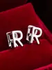 Pendientes de botón casuales de moda populares, creativos, con diseño de letra, simples, versátiles para el día a día, de alta calidad, lujo ligero