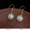 Versão coreana estilo TikTok de brincos de pérola populares para mulheres, luxo leve com sensação de alta qualidade, brincos versáteis de nicho, acessórios de orelha elegantes e modernos