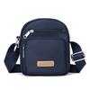 Comércio Exterior Transfronteiriço 2024 primavera novo bolsa de tecido Oxford tamanho pequeno bolsa mensageiro bolsa de ombro bolsa para celular bolsa feminina