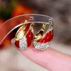 Brincos Europeus e Americanos de Indústria Pesada Estilosos Modernos Cheios de Diamantes Gota d'Água Pétala Franja Ankora Vermelho Outono e Inverno Festivos Quentes
