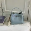 Bolso de axila de gran capacidad para mujer, nuevo para la primavera de 2026, transfronterizo, bolso de un solo hombro, juego madre-hija, bolso tipo cubo para el trabajo de mujer