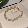 Pulseira de Pérolas Shijia Pulseira Empilhada de Camada Dupla Redonda Ninho de Luxo Leve Exquisita Pulseira de Pérolas Francesas Novo Estilo 2025