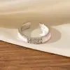 Anel Letra H Mais Vendido Transfronteiriço para Mulheres Cobre Banhado a Ouro Esmalte Leve Luxo Design Requintado Aberto Ajustável Anel de Dedo Atacado