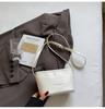 Bolso Transfronterizo de Cuero Suave de Color Sólido con Patrón Tejido Estilo Francés para Mujer, Bolso de Mano y Bolso Cruzado Elegante Versátil Simple para la Primavera 2026
