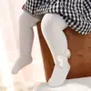 Leggings infantis transfronteiriças, estilo primavera e outono, versáteis para usar ao ar livre, design infantil de listras verticais com um laço grande, meias-calças para bebê