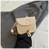 Bolsa sela estilo francês Shuai Mijia 2026 outono inicial nova padrão trançado bolsa pequena estilosa bolsa transversal retrô nicho para mulheres