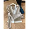 Altamente recomendado! Conjunto de malha de alta qualidade na cor aveia para mulheres, com duas peças e mangas compridas, perfeito para o outono, com um design de gola halter que cria um visual elegante e que afina a silhueta.