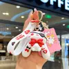 Liquidación de colección de llaveros colgantes de personajes de dibujos animados IP auténticos, lindos colgantes de estrella-luna-conejo para bolsos de niñas, stock para vendedores ambulantes