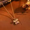 Collar con Lazo Morado-Azul Versátil de Temperamento Estilo Europeo para Mujer Cadena de Acero Inoxidable de Lujo Ligero Moda de Alta Calidad