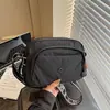 Bolsa de tela simple para mujer 2026 transfronteriza, bolsa de hombro cruzada ligera casual para el día a día, bolsa portátil para teléfono de viaje