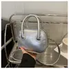 Bolsa Feminina Design Nicho Estilo Coreano 2025 Nova Retrô Simples Bolsa de Mão Textura para o Dia a Dia Bolsa Transversal Redonda