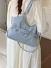 Bolsa de motocicleta coreana de nicho para mujer, nueva y moderna de moda 2026, bolso tote dulce y genial, bolso de mano de gran capacidad para el trabajo