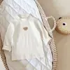 Camiseta básica de manga larga de color liso para bebé, unisex, cuello medio alto, prenda interior cálida, ropa de oso de dibujos animados estilo coreano
