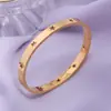 Pulsera de Acero de Titanio Hueca de Estrella de Cinco Puntas Caliente Transfronteriza Todo Partido Viento Rojo de Internet para Damas Pulsera Abierta de Acero Inoxidable 18K