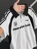 Camiseta Polo Deportiva de Verano para Hombre Estilo Americano con Estampado de Letras, Media Cremallera, Manga Corta y Bloques de Color