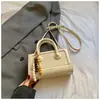 Bolsa Retrô para Mulheres 2026 Nova Elegante de Alto Valor Moda Bolsa de Ombro para Trabalho e Deslocamento Transversal Pequena Quadrada