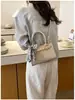 Bolso cruzado de color liso exquisito estilo coreano transfronterizo, nuevo bolso de mano casual simple de moda 2026, bolso de hombro versátil