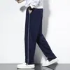 Calças casuais de uniforme escolar para primavera e outono, azul marinho com uma única faixa, modelagem solta, estilo de perna reta, adequadas para alunos do ensino fundamental e médio, tanto meninos quanto meninas