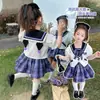 Traje de Verano Kuromi para Niñas 2026 Nuevo Estilo Preppy para Niños Traje JK Falda Plisada para Bebé Conjunto de Dos Piezas