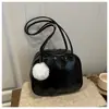 Bolsa Feminina Estilo College Tendência Bolsa Almofada 2025 Nova Bolsa de Mão para o Trabalho Casual Retro Bolsa de Ombro