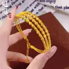 Pulsera Cilíndrica de Cinco Líneas Estilo Palacio Retro Personalizada de Guangguan con Cadena de Cola Ajustable para Mujer, Lujo Ligero y Solidez del Color Duradera
