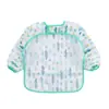 Bata de Alimentación Impermeable de Manga Larga Reversible para Bebés y Niños 2026 con Bandeja para Comida
