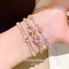 Pulsera geométrica de flor de zirconio con cierre de broche, europea y americana, pulsera vintage de nicho de alta gama, joyería versátil y elegante para mujer