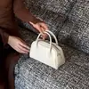 Bolso Boston de cuero curtido vegetal 2026 nuevo bolso de boliche pequeño de cuero genuino versátil bolso de mano vintage bolso cruzado para mujer