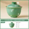 Taza de té Firestone Roja y Verde Orquídea Blanca Gardenia para una Persona, Tazón de Té Cerámico de Alto Valor, Juego de Té Kung Fu Doméstico de Gama Alta
