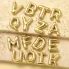 Europa y Estados Unidos venta caliente oro real 18k acero de titanio 26 letra colgante burbuja acero inoxidable joyería accesorios diy colgante de collar