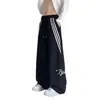 Pantalones de pierna ancha holgados versátiles de moda Harajuku para otoño para hombres y adolescentes, pantalones a rayas de moda estilo Hong Kong ins