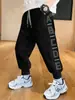 Pantalones de chándal para niño Primavera y Otoño 2025 Nuevo Estilo para Niños Mayores, Pantalones Largos Deportivos Modernos y con Estilo, Pantalones de Moda de Otoño
