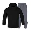 Suministro directo de fábrica otoño e invierno marca de moda para hombre suéter traje de suéter para hombre con capucha suéter más terciopelo para parejas suéter de color liso