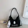 Mochila Casual Grande Capacidade para Mulheres 2026 Novo Estilo Bolsa Única Ombro Estudante Escola Bolsa Transversal Versátil de Nicho para o Dia a Dia