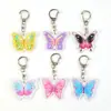 Llavero de Mariposa Colorida, Mochila Escolar para Niña, Funda para Auriculares, Colgante de Acrílico, Llavero, Accesorios, Regalo de Vacaciones
