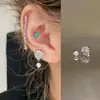Clavos para Hélice de Oreja de Gota de Agua de Saturno Microincrustados Pendientes de Acero de Titanio Médico Estilo Coreano de Lujo Accesible de Nicho Pendientes para Piercing de Oreja para Mujeres