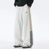 Calça de moletom listrada estilo americano, nova coleção de outono, corte solto, com caimento, color-blocking, bordada, esportiva, versátil, calça longa casual