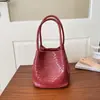 Bolsa Tejida en Relieve de Color Sólido Más Vendida Transfronteriza para Mujer Nuevo Estilo Otoño 2026 Bolso de Mano de Moda de Alta Gama para Mujer