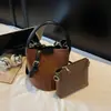 Bolsa Balde Fosca Retrô Feminina 2026 Nova Tendência Moda Bolsa de Mão para o Trabalho Veludo Camurça Bolsa Mãe e Filho Bolsa Transversal