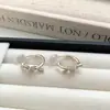 Aretes de Nudo de Cuerda Dorada para Mujer, Diseño de Nicho de Lujo Ligero, Temperamento Único de Gama Alta, Pinzas para Orejas Únicas, Accesorios para Orejas, Nuevo Estilo Caliente 2026