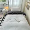 2026 Nuevo Modelo Color Sólido Dos Tonos Cama Individual para Estudiante Juego de Tres Piezas Cama Litera de Dormitorio Funda de Edredón Individual Funda de Edredón Pieza Única