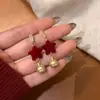 Pendientes de Fuegos Artificiales de Circonita Roja de Año Nuevo para Mujer 2026 Nuevo Estilo Popular Pendientes Únicos y Hermosos