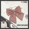 [Cerdo Castaño JK] Color Sólido Raíz de Pluma Lazo Oblicuo Estudiante Camisa de Mujer Joker Japonés Cuello Pequeño Flor Básico