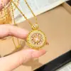 Collar con colgante de brújula de ocho tesoros giratoria, chapado en oro, polvo de diamante, para mujer, lujo ligero, sensación de alta gama, cadena para suéter, giratorio