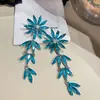 Pendientes florales con incrustaciones de diamantes estilo moda europea y americana, lujo ligero, alta gama, elegantes, únicos, modernos, versátiles.